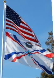 American Assyrian Flags over the blue sky of San Jose California